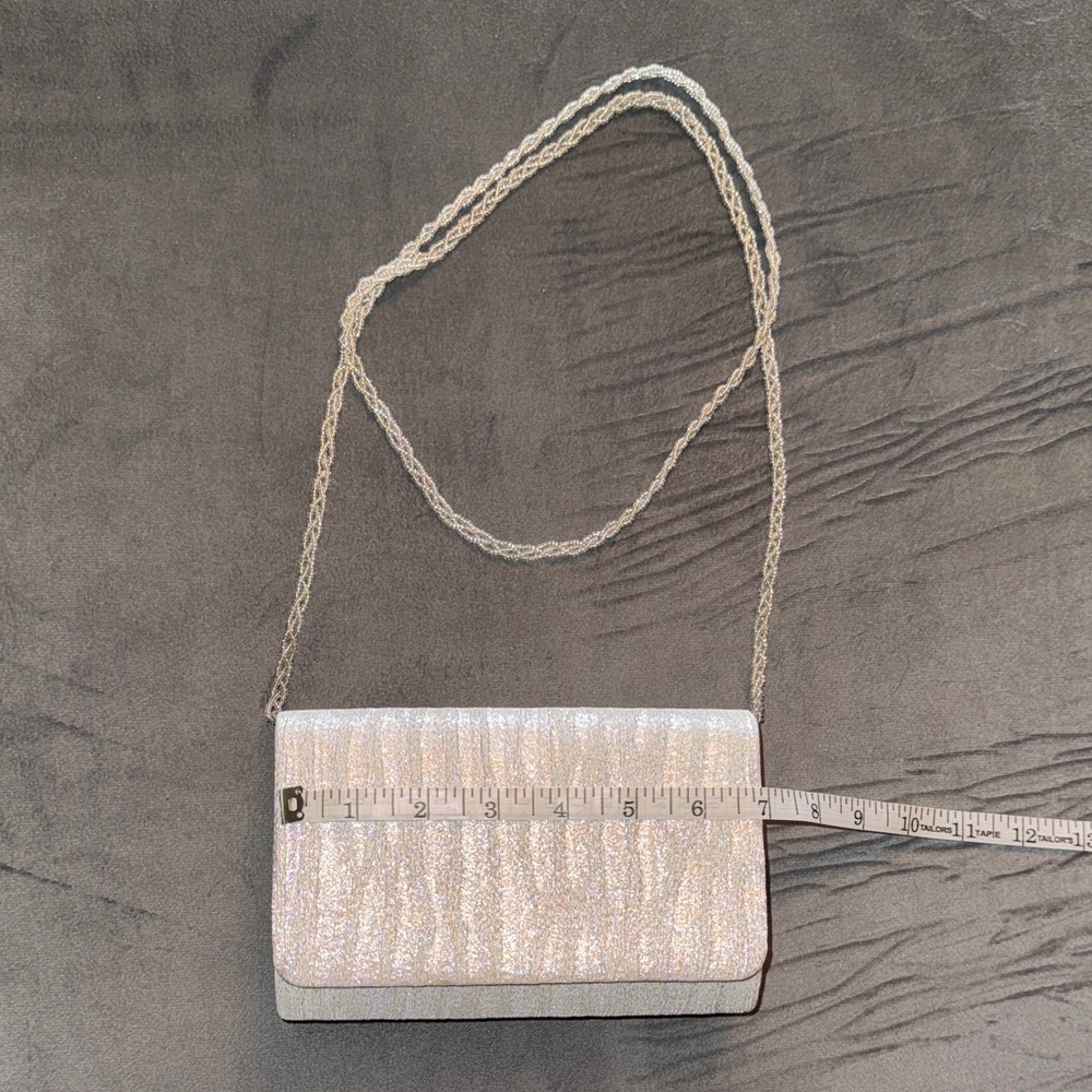 SilverMetallic Clutch with Modern Silhouette